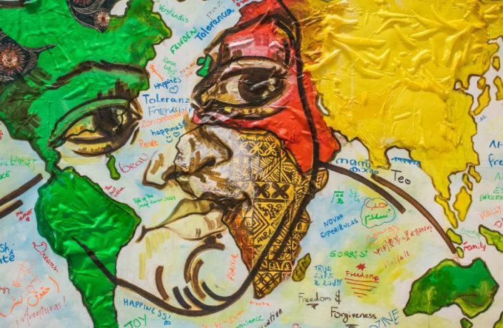 Painting of person with map on face