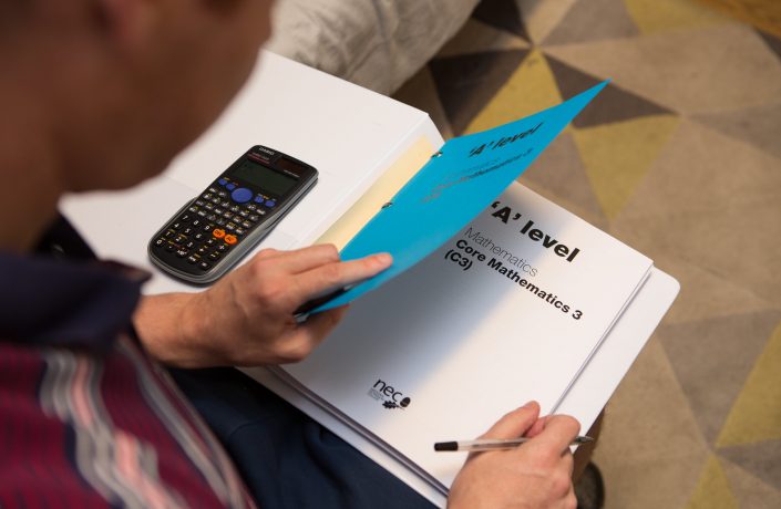 Prison learner with textbook